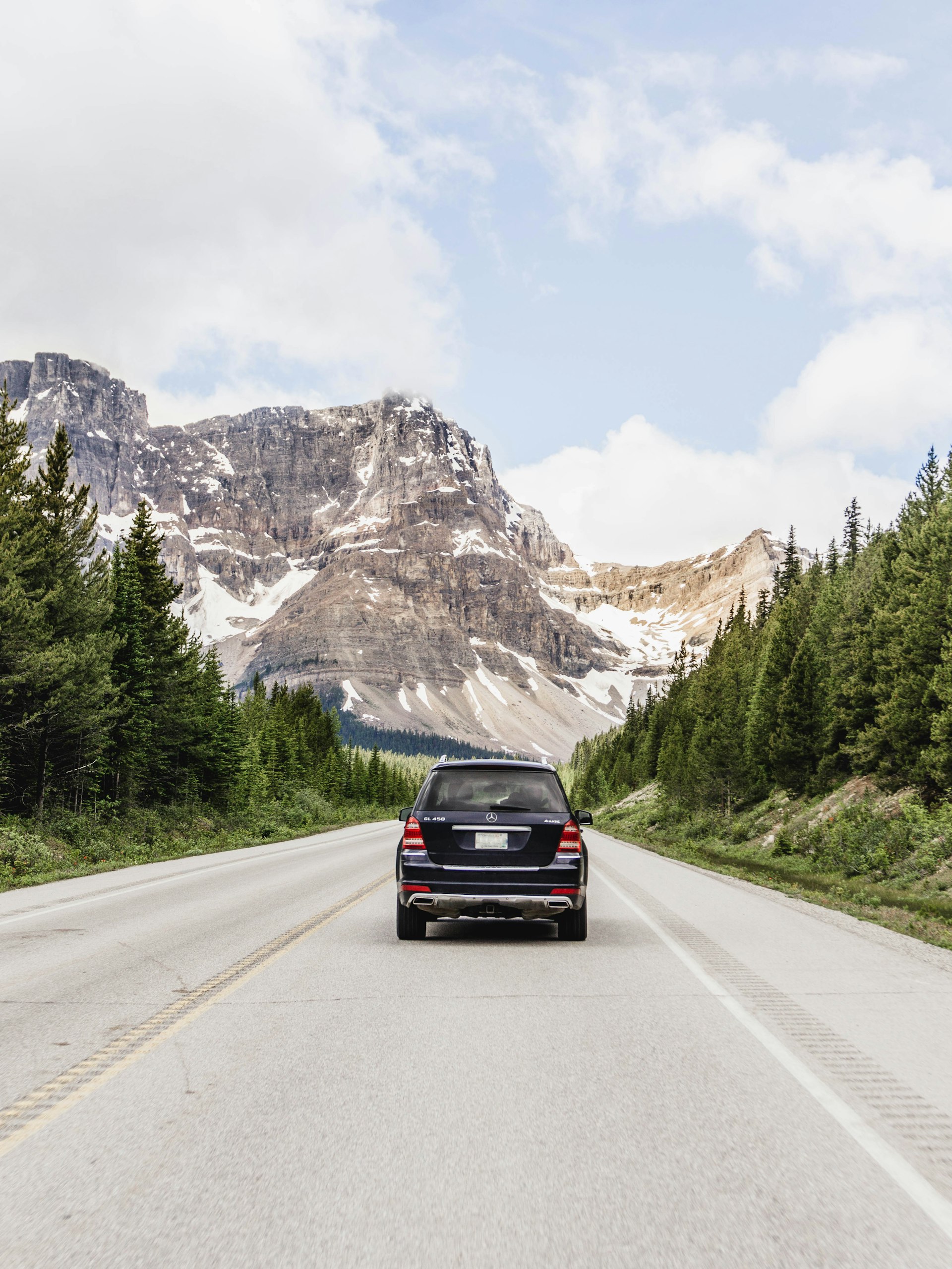 SUV driving a mountain highway
